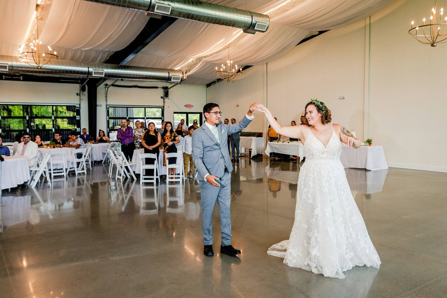 A couple dancing together at their wedding reception